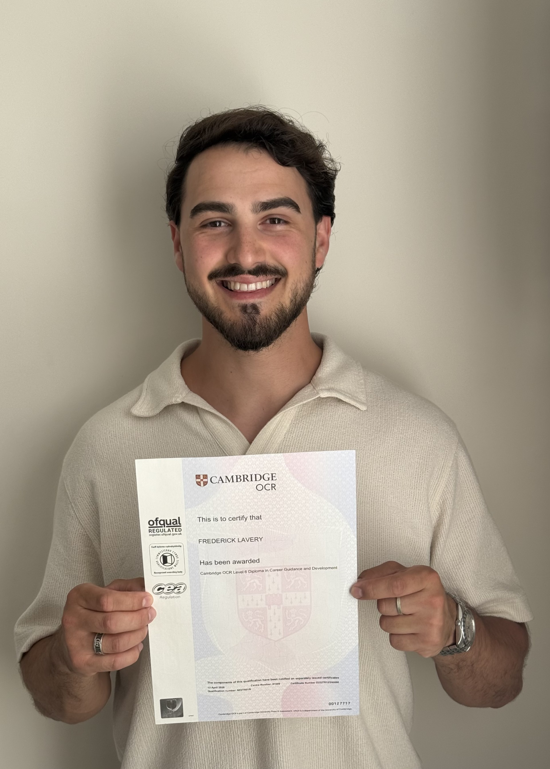 Frederick Lavery holding his OCR Level 6 Diploma in Career Guidance and Development