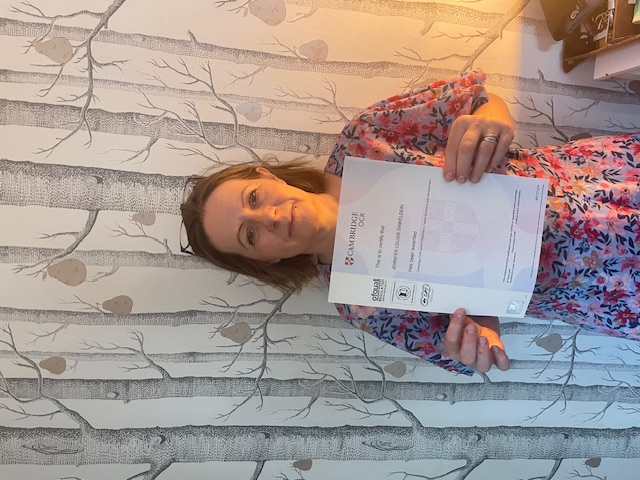 Jennifer Louise Dinfeleden holding her OCR Level 6 Diploma